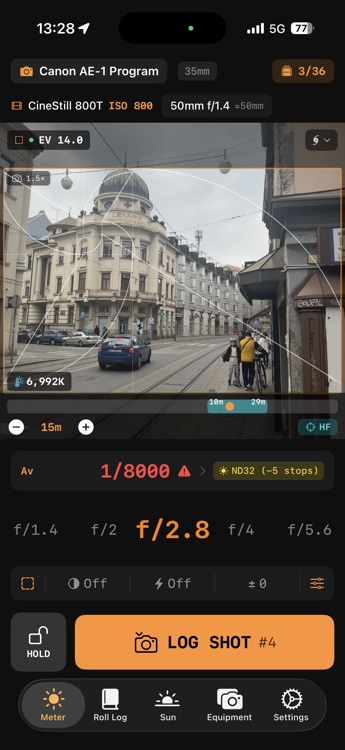 F8t golden spiral composition overlay on live camera viewfinder with ND filter suggestion